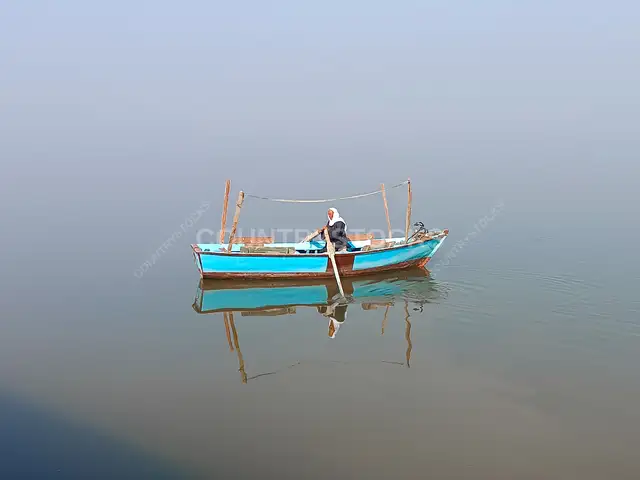 Fisherman on Blue Boat, Lake Qarun Fayyum