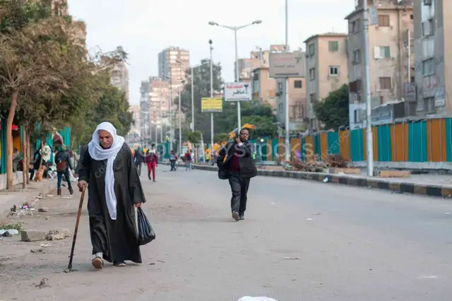 Elderly Man with Cane on Sudan Street, Cairo