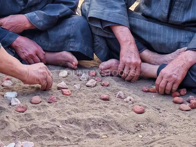 Elderly Men Playing Sabaa'awiya (Seega) in Rural Egypt