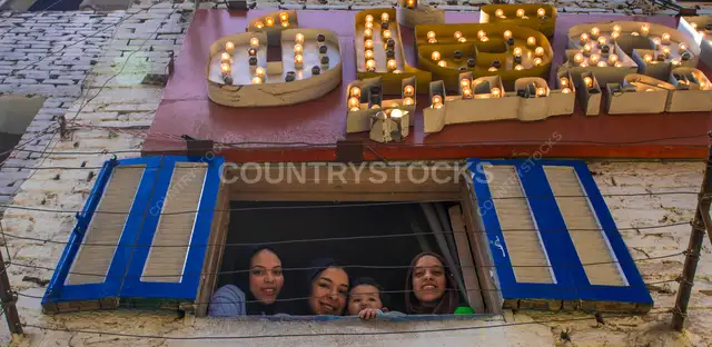 Family at Window During Ramadan Iftar, Matriya Cairo