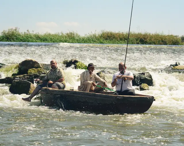 Fishermen on Wooden Boat, Al-Qanatir Al-Khayriyya, Egypt
