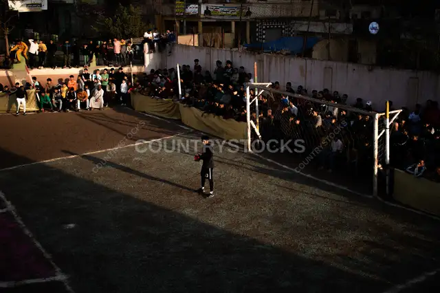 Goalkeeper Under the Afternoon Sun