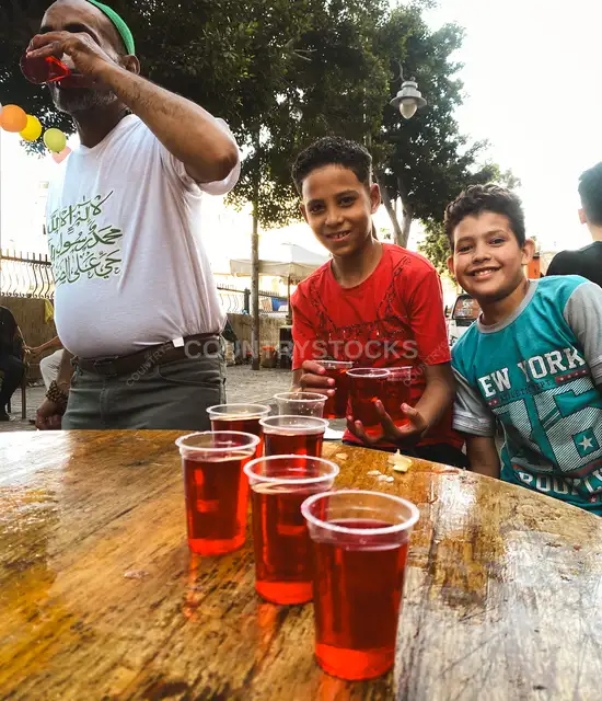 Sharbat Vendor Serves Children, Al-Manshiya Alexandria