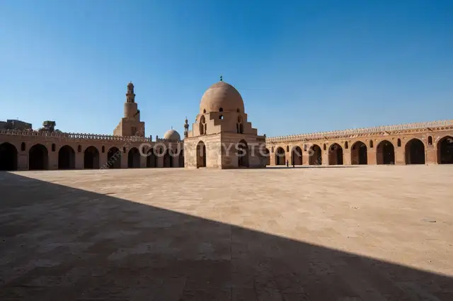 Architectural view of the central dome and spiral minaret of the historic Ahmad Ibn Tulun Mosque in Old Cairo, Egypt - 2