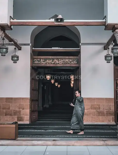 Man Exiting Al-Azhar Mosque Entrance, Cairo