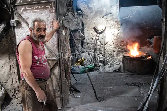 Traditional Metalworker in Al-Farahda Workshop, Alexandria