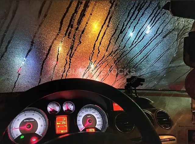 Raindrops on Car Windshield at Night, Giza