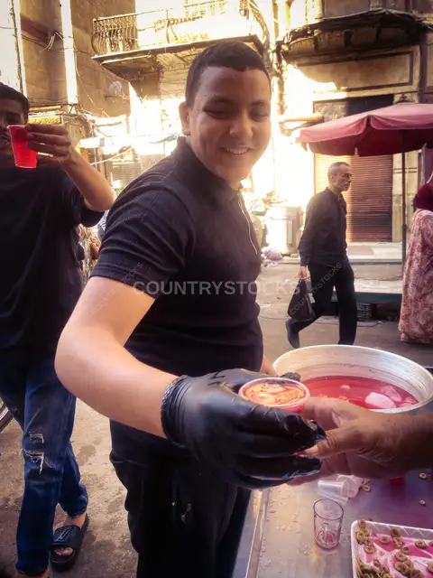 Sharbat Vendor Serving Festive Drink, Al-Manshiya Alexandria
