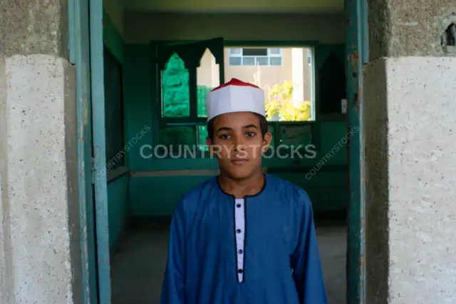 Azhar School Student in Traditional Uniform, Qena