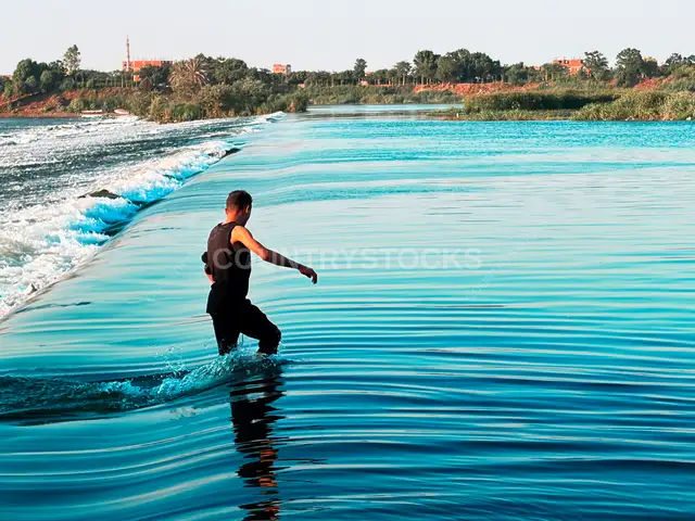 Child Wading in Nile Waters, Al-Qanater Al-Khayreya