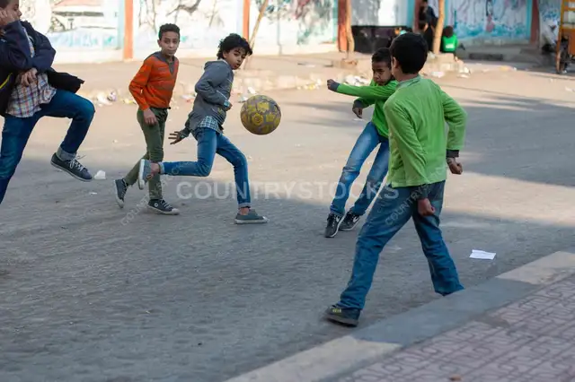 Boys Playing Street Football on Sudan Street Cairo