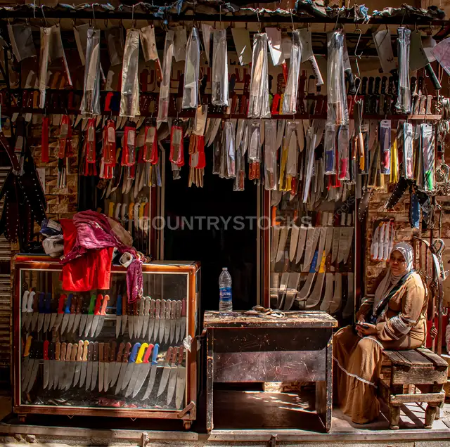 Traditional Knife Sharpener Shop with Hanging Knives in Old Maadi