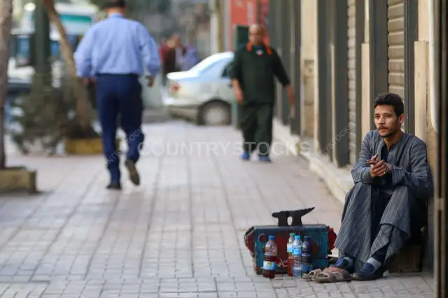 Shoeshiner Waiting for Customers on Magles el Wozara Street, Downtown Cairo (Wust el Balad) (Wust el Balad) 2