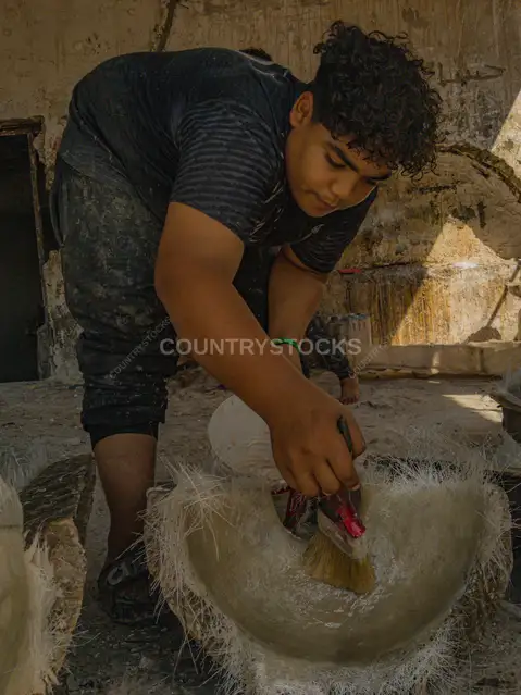 Potter Applying Finishing Coat to Clay Vessel, Cairo