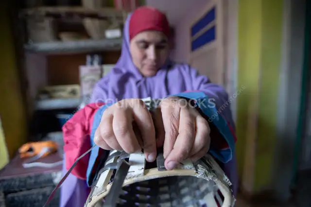 Egyptian Local Artisan Creating Handmade Bamboo Crafts in Egypt