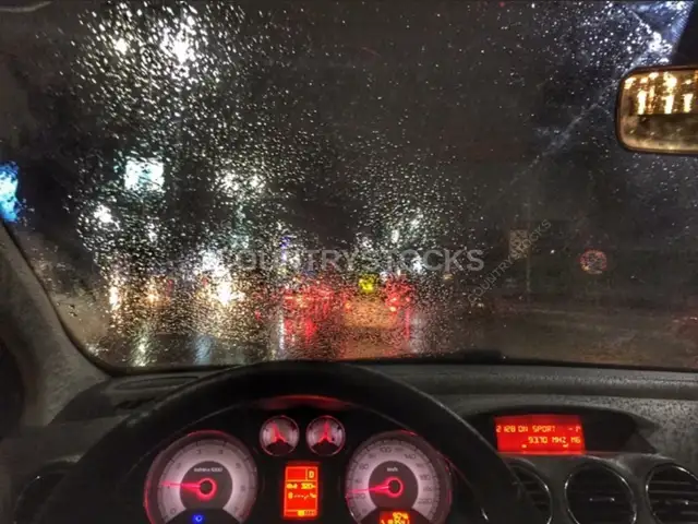 Raindrops on Car Windshield at Night, Cairo