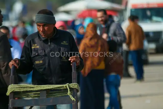 Cairo International Book Fair 2017 Worker Pushing Cart