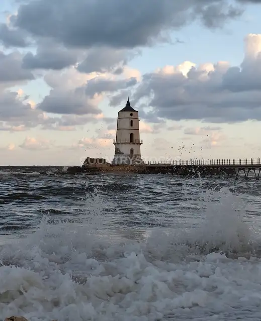 El Max Historic Lighthouse Amid Crashing Mediterranean Waves