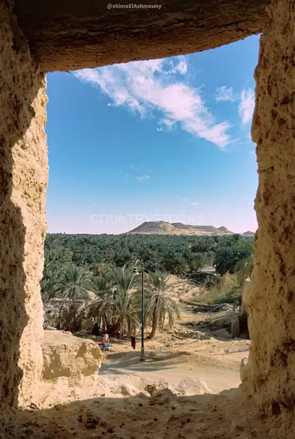 Siwa Oasis Framed Through Mountain of the Dead Window