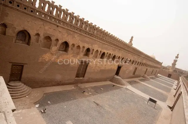 Architectural view of the central dome and spiral minaret of the historic Ahmad Ibn Tulun Mosque in Old Cairo, Egypt - 6
