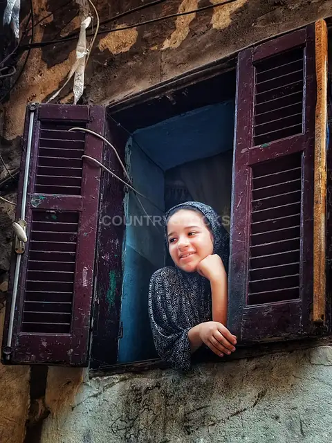 Smiling Girl at Old Wooden Window, Al-Gamaliya Cairo