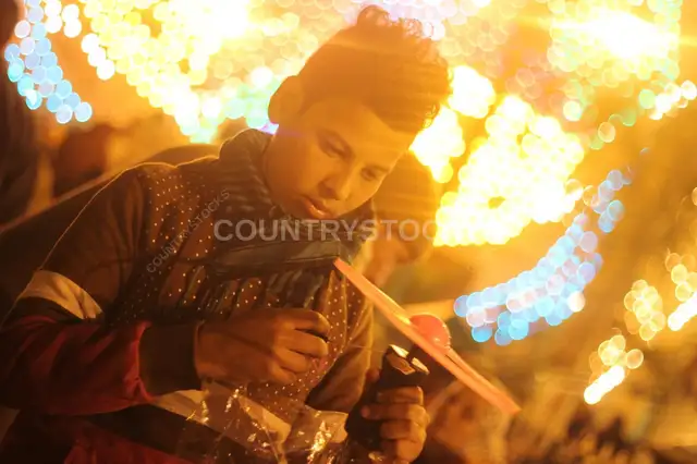 Portrait of a Child Playing at a Traditional Egyptian Mawlid – Cairo, Egypt
