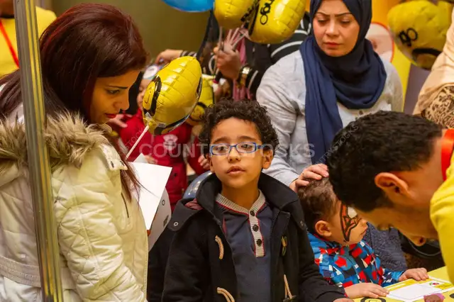 Egyptian Families at Indoor Children's Event Cairo