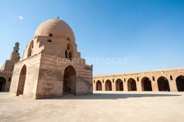 Architectural view of the central dome and spiral minaret of the historic Ahmad Ibn Tulun Mosque in Old Cairo, Egypt - 4