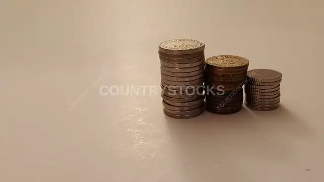 Egyptian Pound Coins Stacked in Decreasing Height