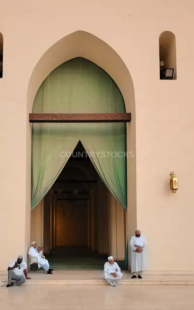 Waiting for Prayer at Al-Hakim Mosque
