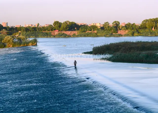 Fisherman Standing on Nile Weir, Al-Qanatir Al-Khayriyya