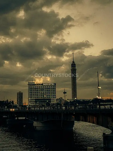 Qasr Al Nile Bridge and Cairo Tower at Dusk