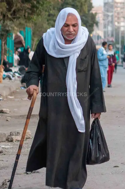 Elderly Egyptian Man Walking Cairo Street, 2017
