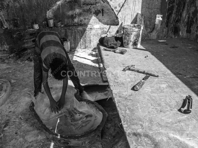 Fiberglass Worker Placing Raw Material, Cairo Workshop