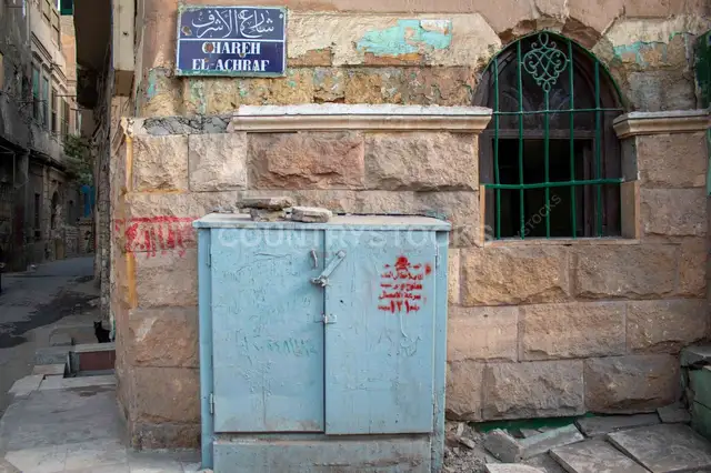 Al-Ashraf Street in Historic Cairo – Old Mosque, Stone Walls and Shrine Window (2017)