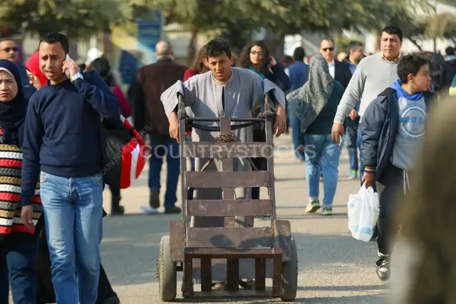 Cairo International Book Fair 2017 Worker Pushing Cart 2