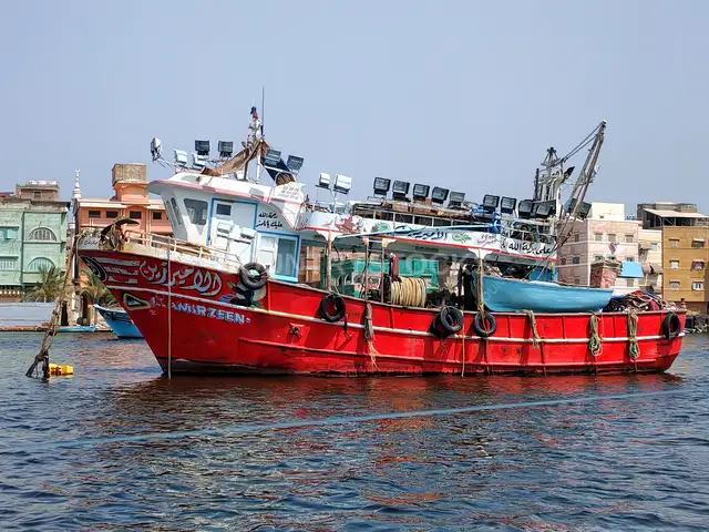 Red Fishing Trawler Docked at Damietta Harbor