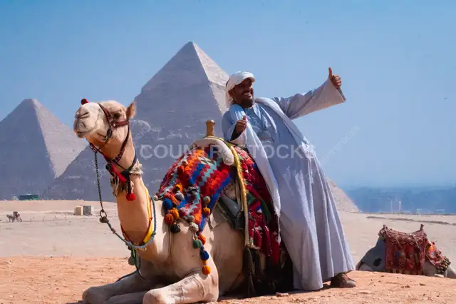 Camel Handler at Giza Pyramids, Egypt