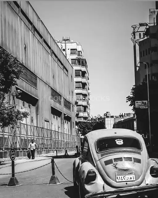 Vintage VW Beetle Parked on Cairo Downtown Street