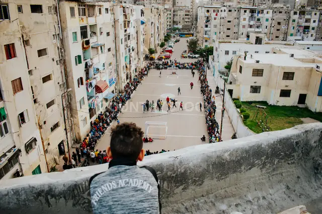 Watching the Match from the Rooftop – Egyptian Street Football