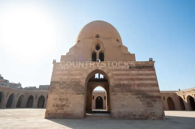 Architectural view of the central dome and spiral minaret of the historic Ahmad Ibn Tulun Mosque in Old Cairo, Egypt - 3