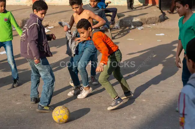 Boys Playing Street Football on Sudan Street, Cairo