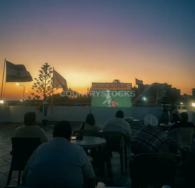 People Watching a Football Match Outdoors in Marsa Matrouh, Egypt