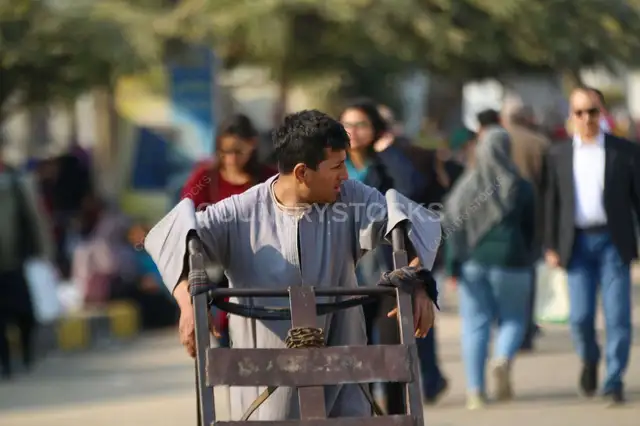 Cairo International Book Fair 2017 Worker Pushing Cart 5