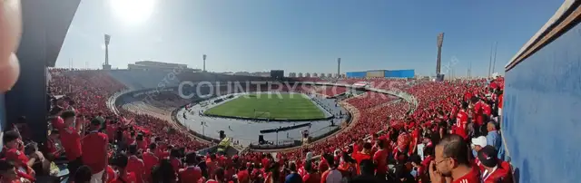Aerial View of Cairo International Stadium During a Football Match