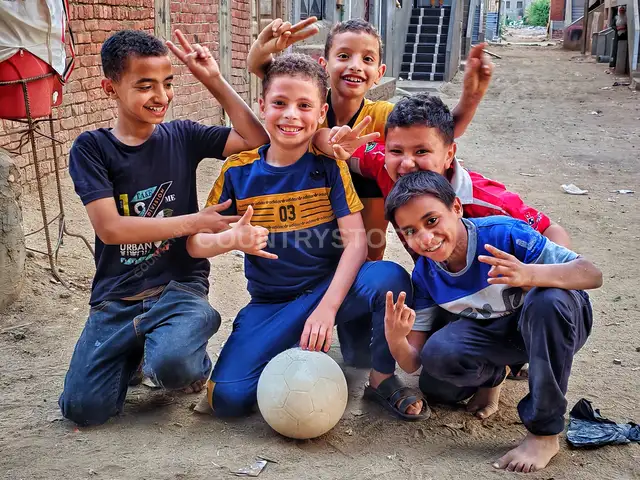 Boys Playing Street Football, Garis Village Al-Monofeya