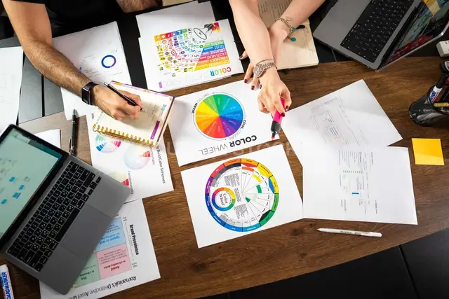 Creative Team Working on Color Wheel and Design Concepts – Office & Business Photography