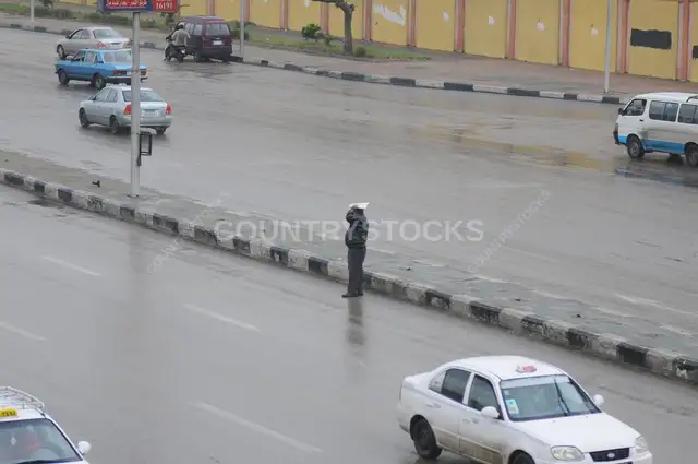 شارع في القاهرة في يوم شتاء ممطر 4