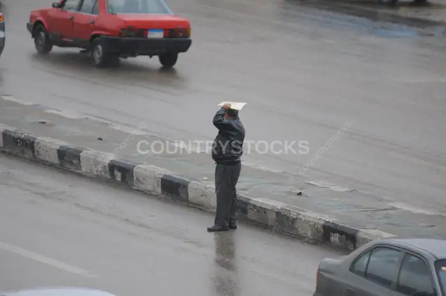 شارع في القاهرة في يوم شتاء ممطر 3