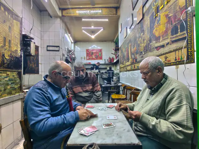 Men Playing Cards at Traditional Cairo Coffeehouse